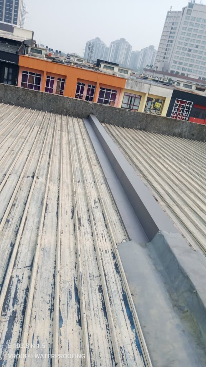 Treatment along a junction between roof sections.