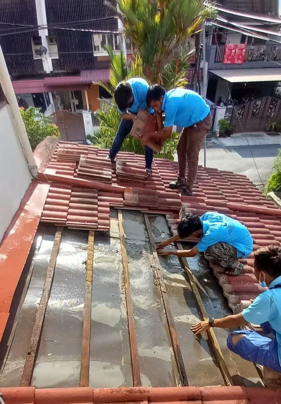 Roof tiles removed during repair work.
